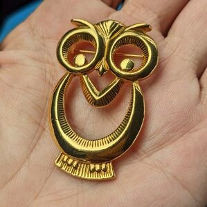 EVC GOLD TONE OWL BROOCH